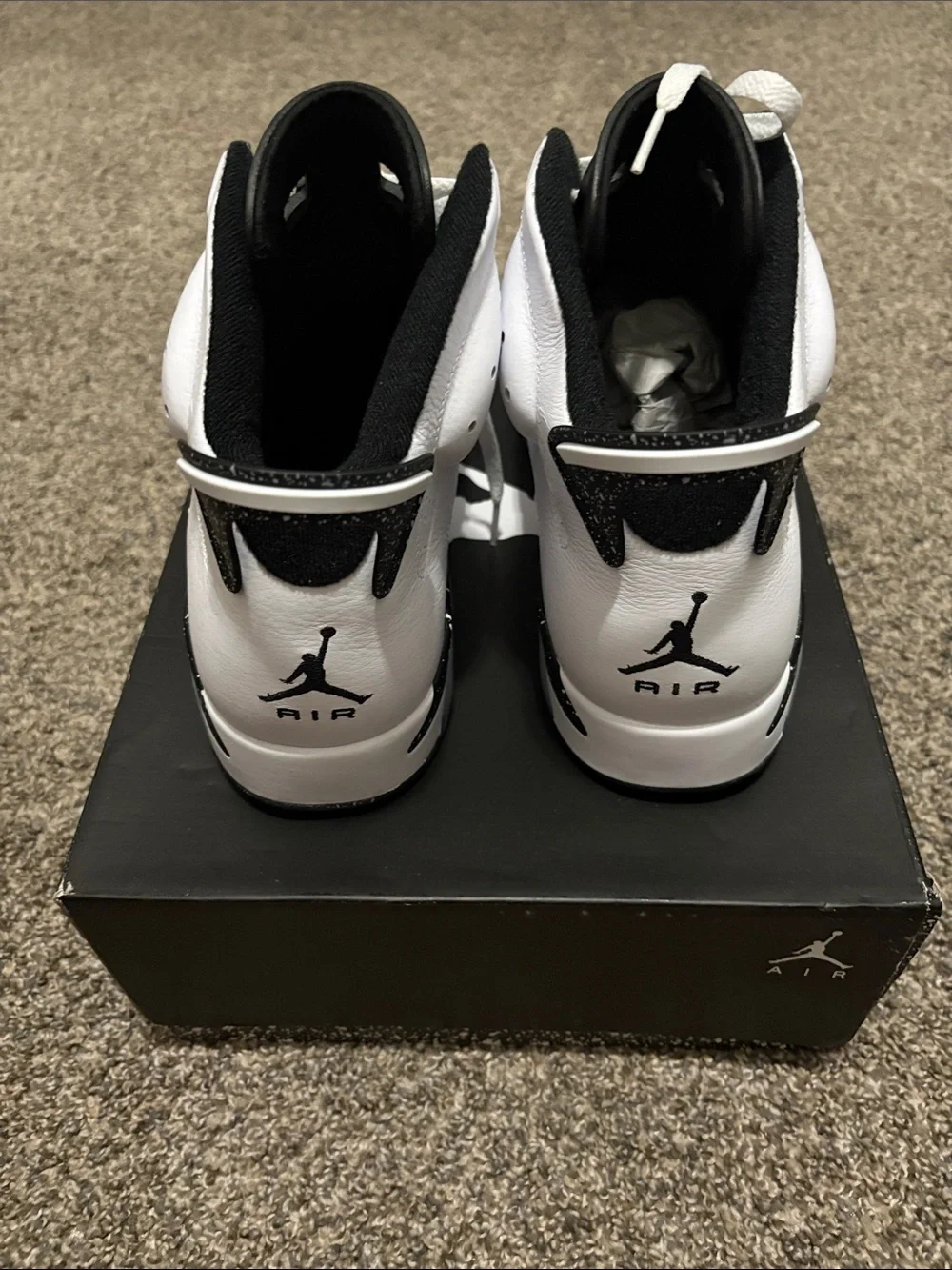 Jordan Retro High-Top Sneakers in White and Black